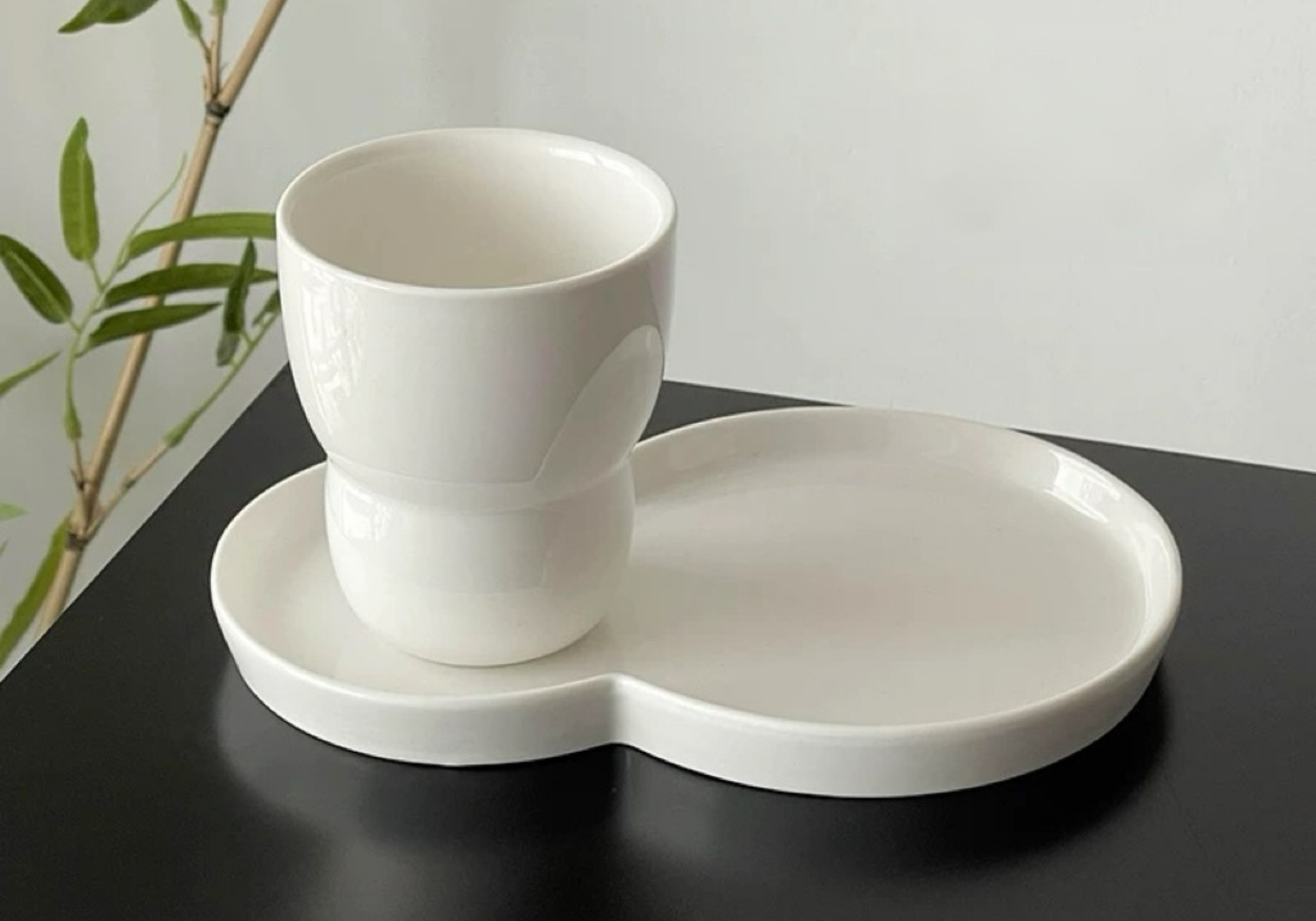 Off-White Ceramic Cup & Saucer Set Untable design story